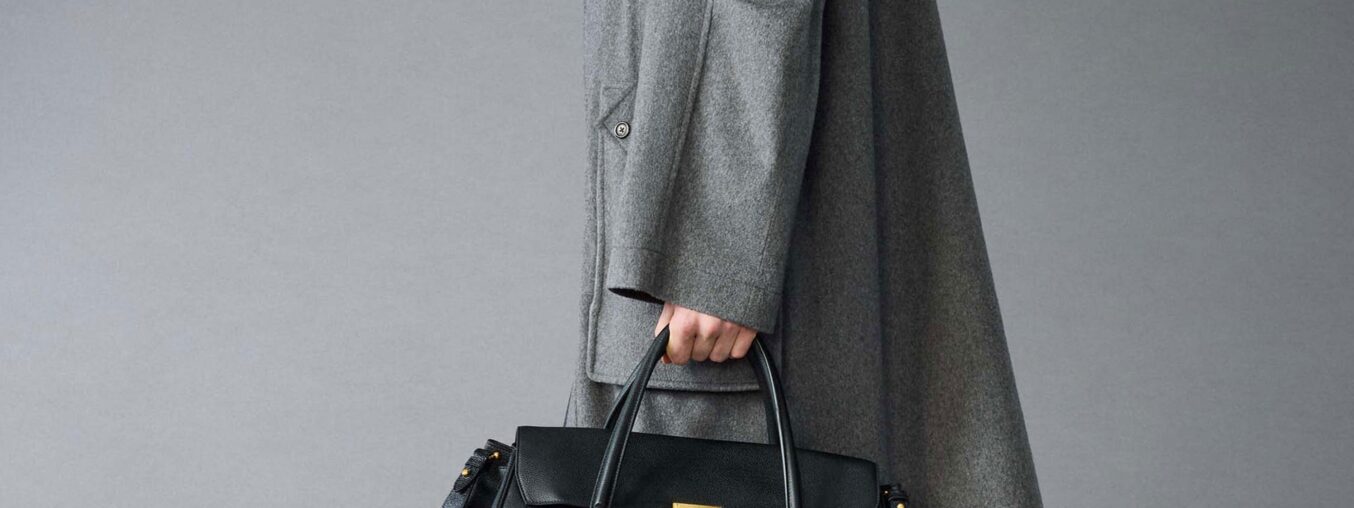 Thom Browne's Pre-Fall 2025 menswear collection blends classic tailoring with playful twists. The designs feature structured silhouettes, unexpected proportions, and Browne's signature attention to detail. Expect refined suits