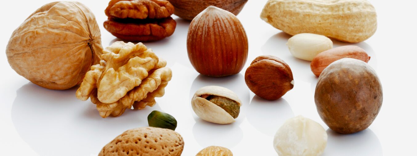 These 5 nuts are rich in protein.  

(Note: The original phrase “packed with” is a common idiom meaning “full of” or “rich in,” so the simplified version keeps