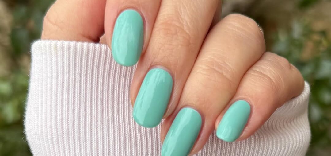 Aquamarine nails are everywhere this summer. Everyone's rocking this fresh, ocean-inspired shade. It's the perfect pop of color for sunny days.