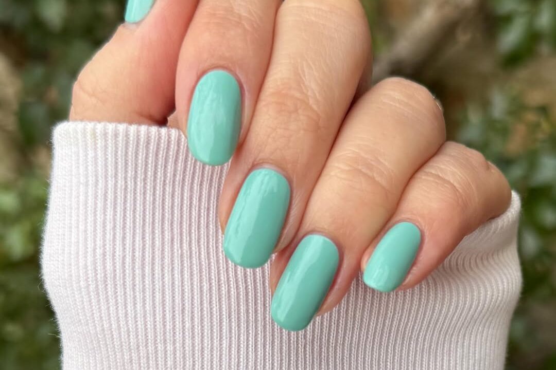 Aquamarine nails are everywhere this summer. Everyone's rocking this fresh, ocean-inspired shade. It's the perfect pop of color for sunny days.