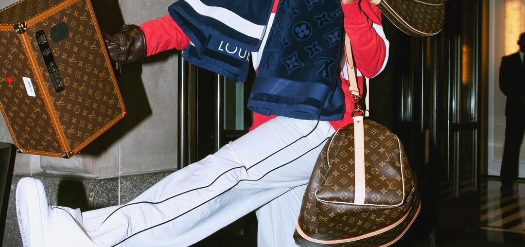 Before the Met Gala, Doechii playfully honors André Leon Talley in a full Louis Vuitton look.