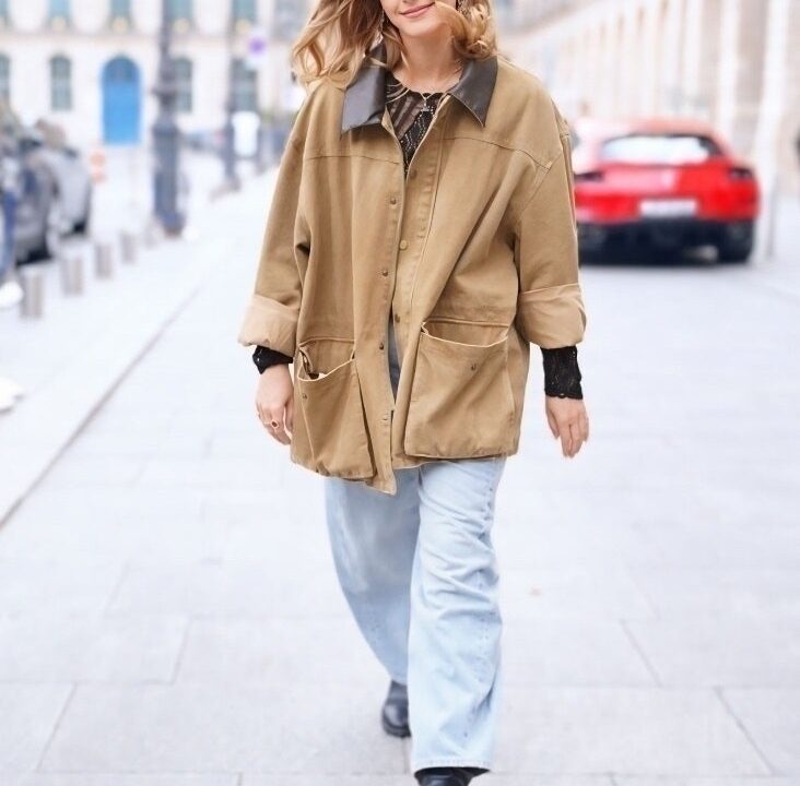 Emma Watson wears budget-friendly coats in Paris.