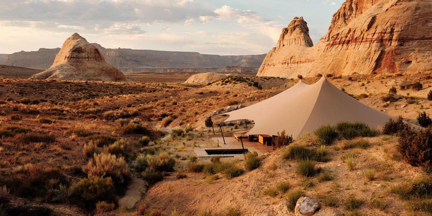 Here are 23 of the best glamping resorts across the United States. These destinations offer luxurious camping experiences with comfortable amenities while keeping you close to nature. From safari tents to treehouses and cozy cabins
