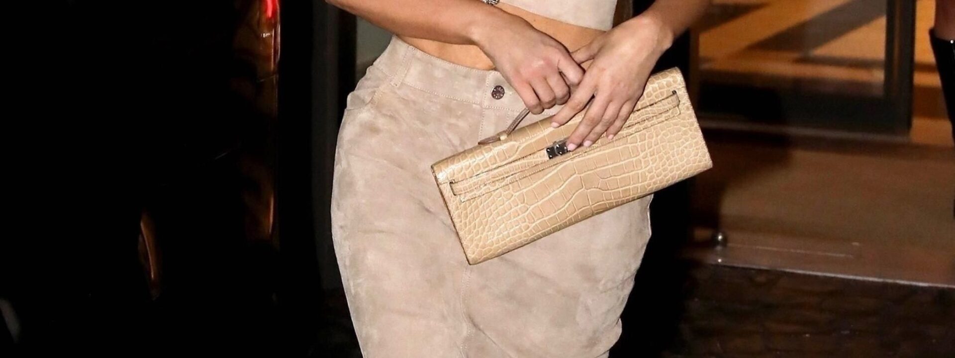 On a Roman evening, Kim Kardashian enjoys her gelato while carrying an ultra-rare Hermès bag.