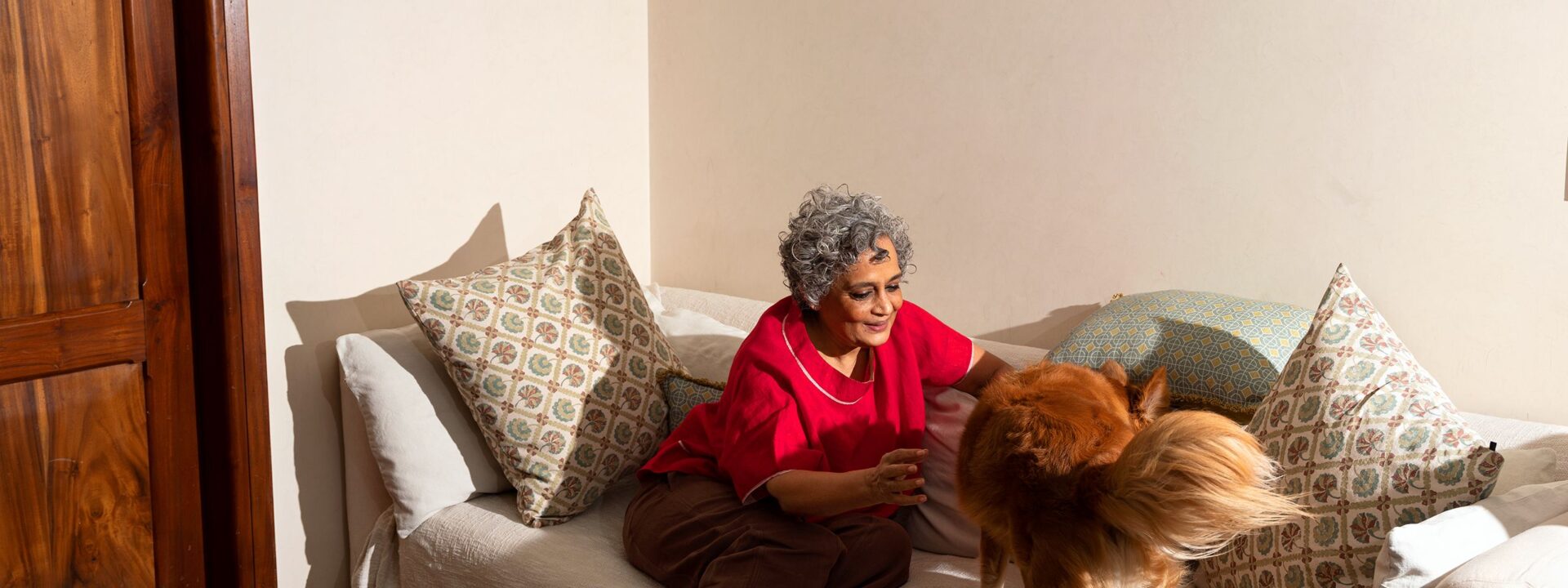 Here's a more natural version of your text:

From Her Memoir: Arundhati Roy Writes About Her Childhood

This version keeps the meaning while making it more straightforward and conversational. I