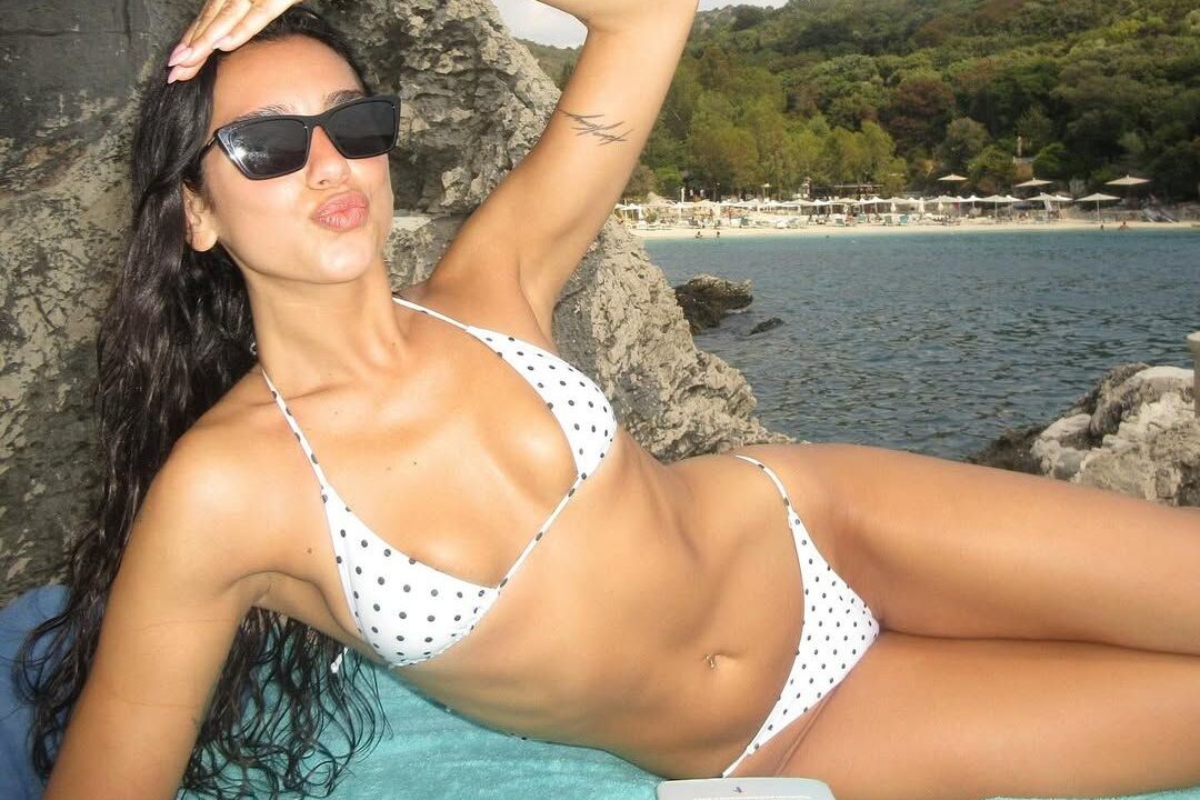 Dua Lipa's go-to party move in Ibiza is an insanely difficult yoga pose.