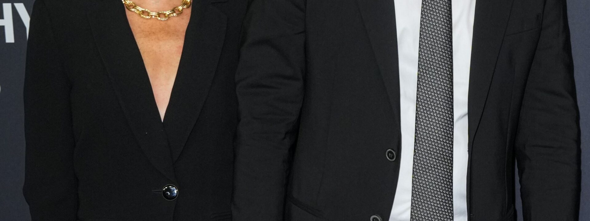 Meghan Markle continues to showcase her stylish flair, this time in an elegant Armani ensemble.