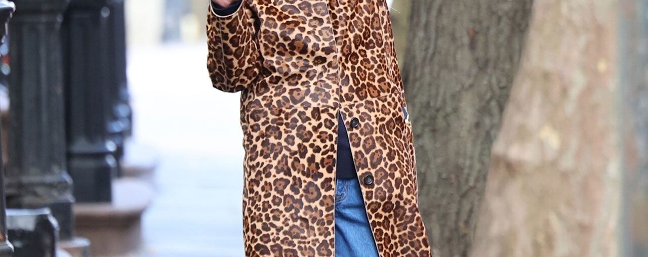 Jennifer Lawrence pairs her favorite leopard coat with an unexpected, festive touch.