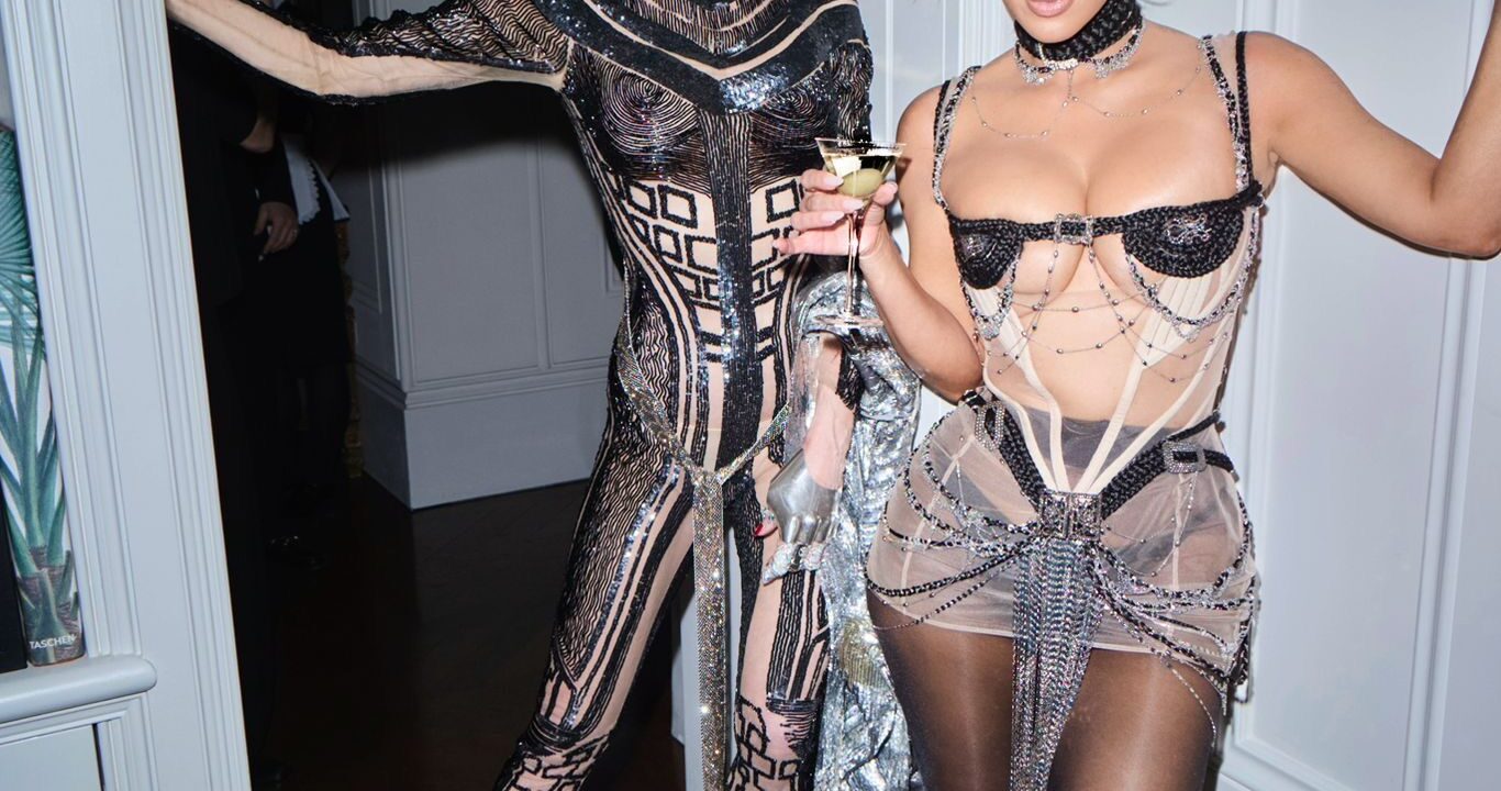 Kim Kardashian dons a bra crafted from hair, leaving little else to the imagination.