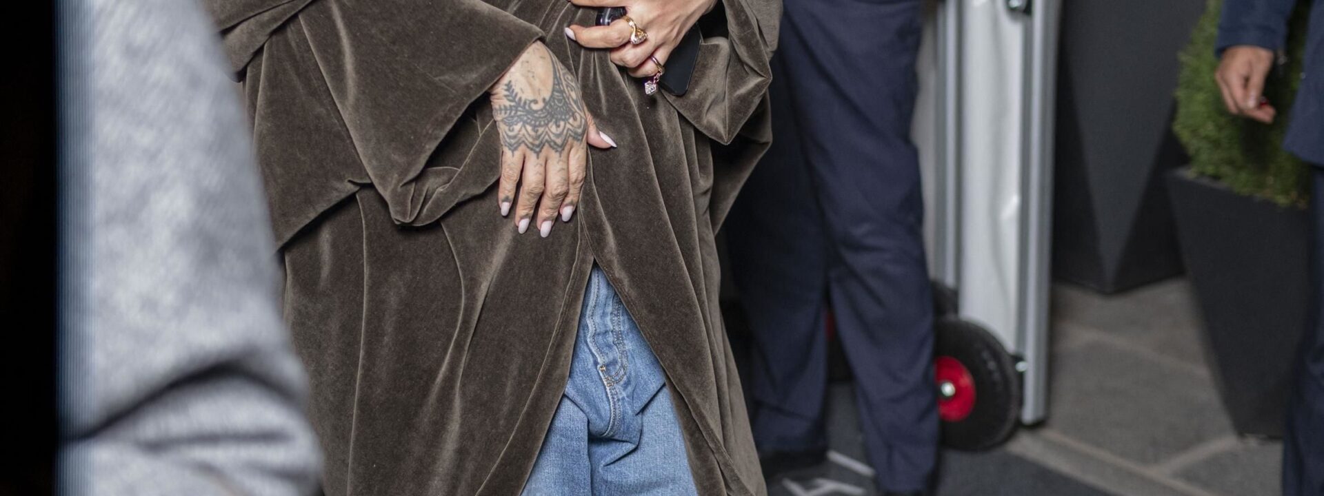 Rihanna rocks the shawl this autumn.
