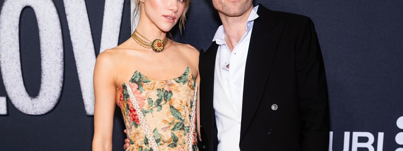 Robert Pattinson and Suki Waterhouse step out together on the red carpet for a rare public appearance.