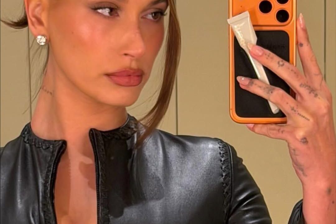 Hailey Bieber puts a cheetah print spin on the classic French manicure.