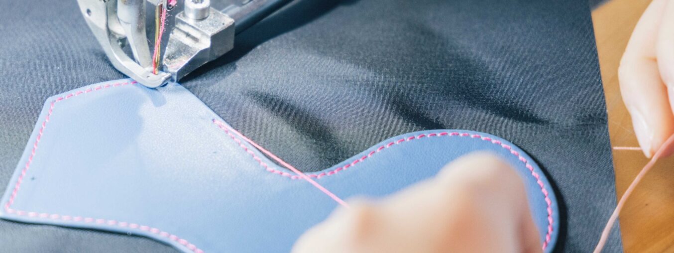 Lorenzo Bertelli and Andrea Guerra discuss Prada's manufacturing heritage and the integration of Versace into the group.