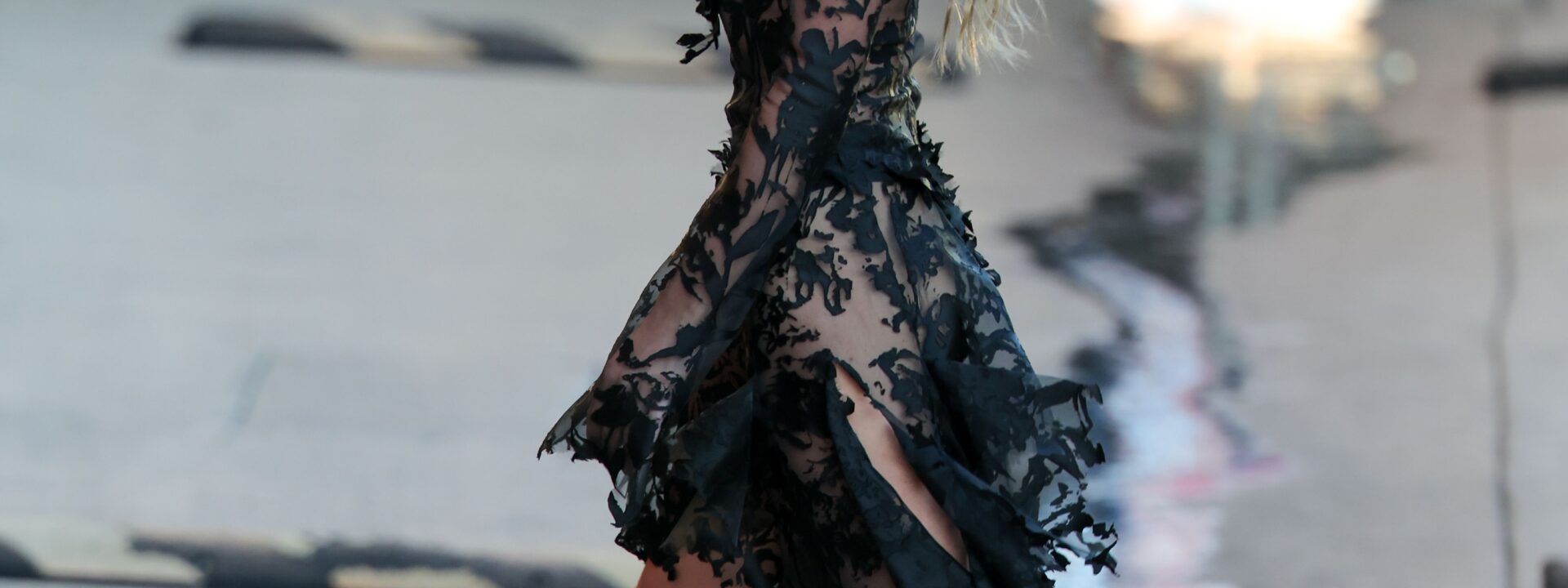 Margot Robbie brings a literary edge to sheer dressing, channeling Emily Brontë's moody romanticism.