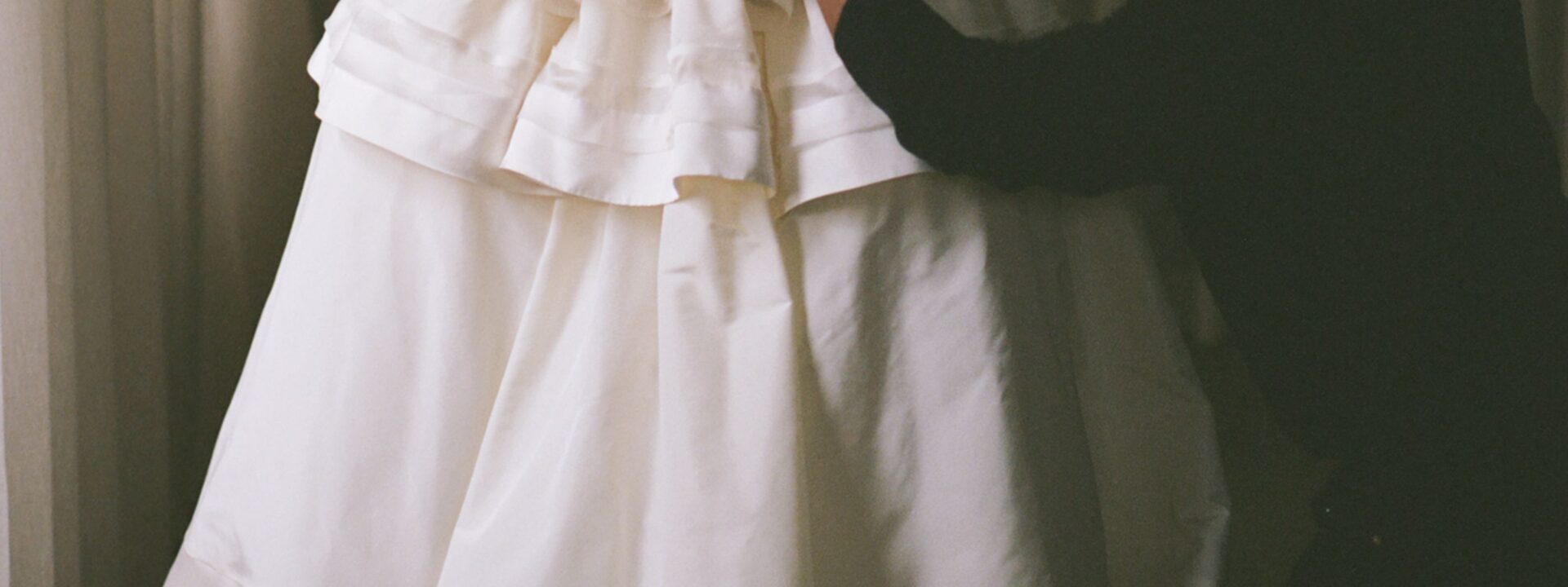 The bride chose a custom Christopher John Rogers gown for her New Year's Eve wedding in Brooklyn.