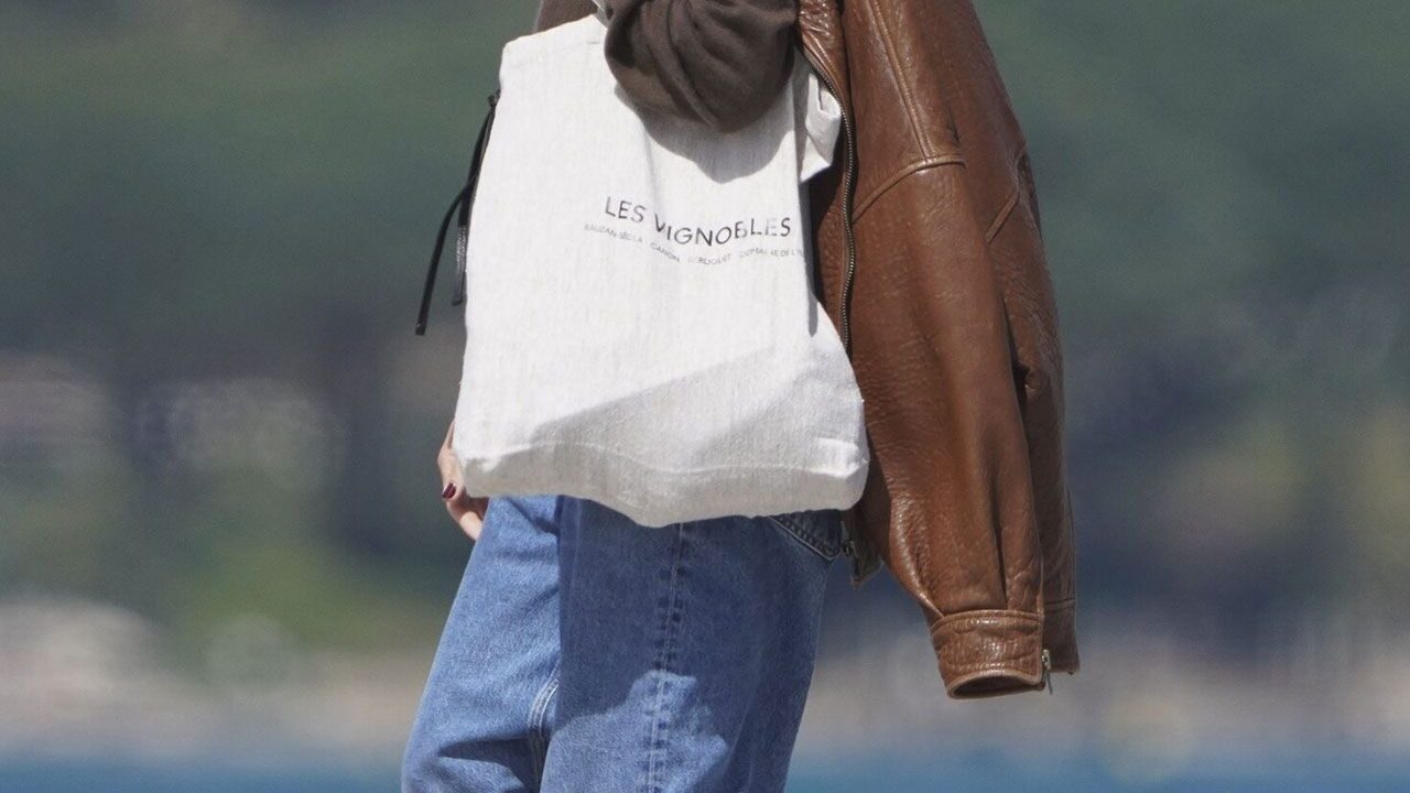 Margot Robbie is ditching boho chic this summer, opting for leather, denim, and suede instead.