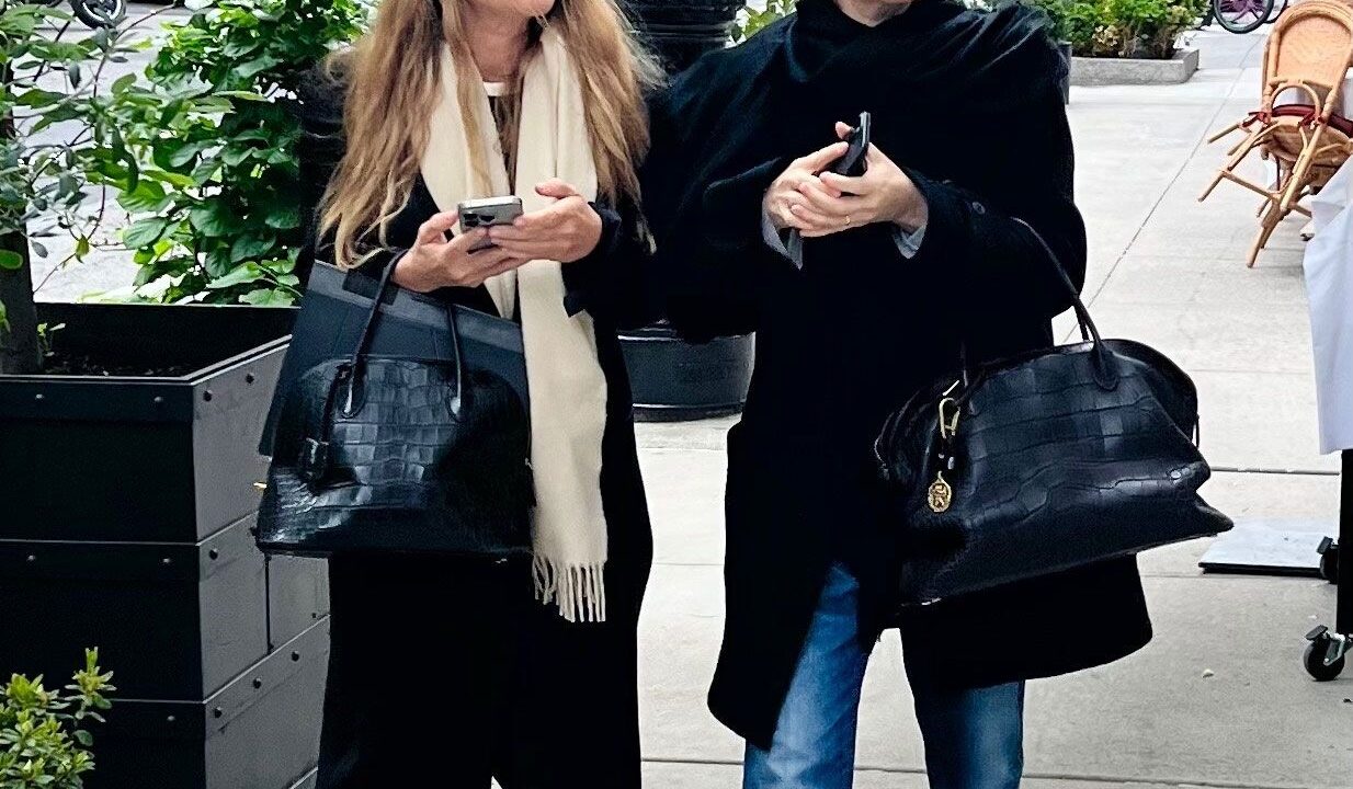 Ashley and Mary-Kate Olsen are twins, and their handbags are twins too.