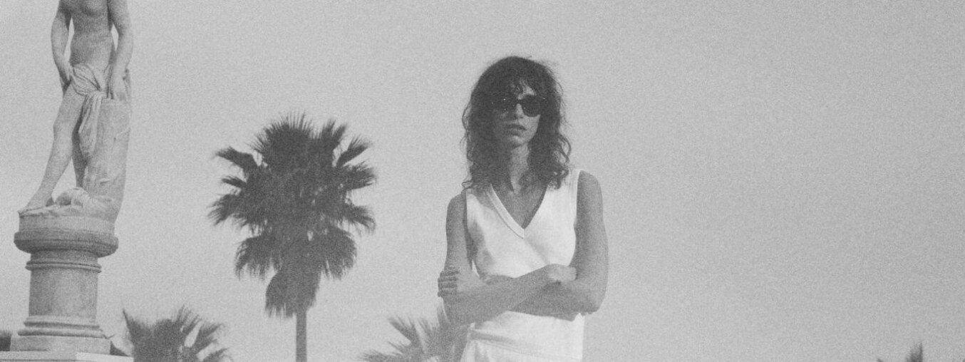 Here's a rewritten version in fluent, natural English:

Vogue’s Essential Summer Travel Capsule Wardrobe