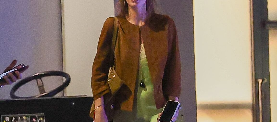 Dakota Johnson is leaning into the trendiest color right now—and pairing it with an unexpectedly bold jewelry pick.