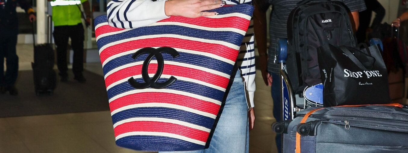 Dua Lipa has supersized the vacation tote bag—airline restrictions be damned.