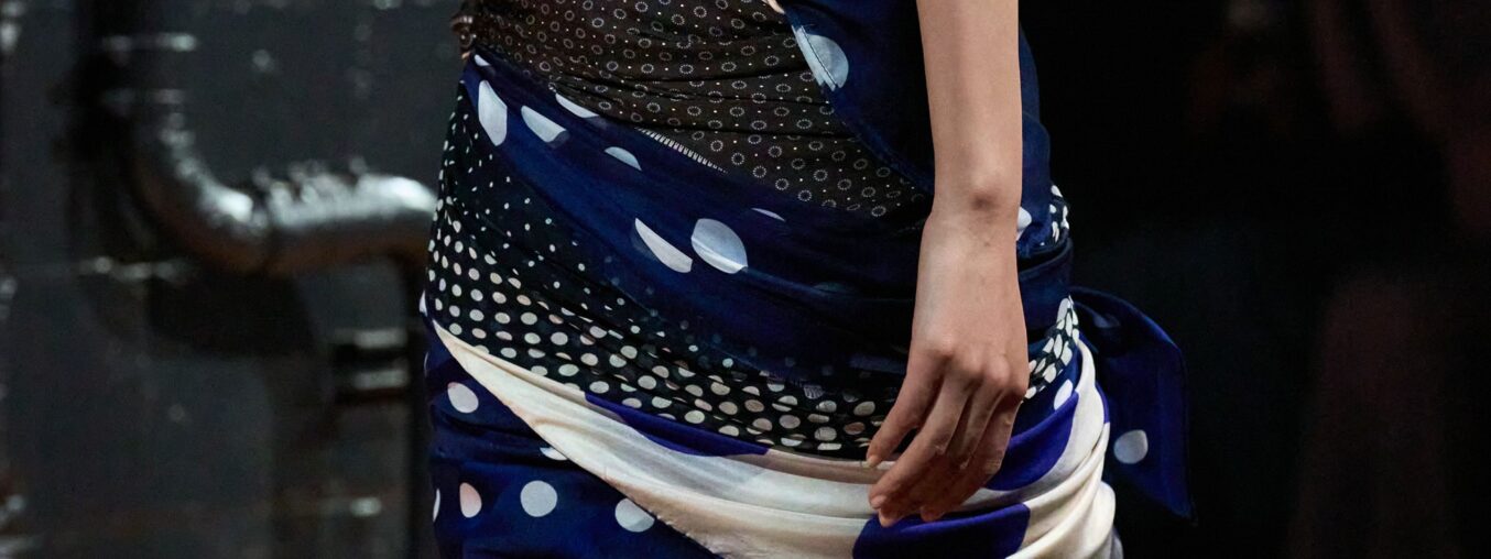 Fashion has made the old-fashioned silk scarf trendy once more.